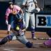 Michigan center fielder Lyndsay Doyle slides into home plate as Northwestern catcher Paige Tonz bobbles the ball on Friday, May 3. Daniel Brenner I AnnArbor.com